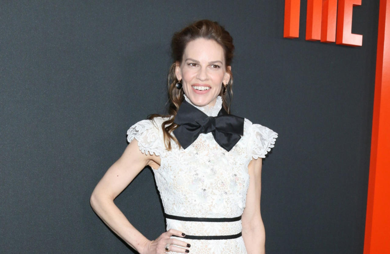 Hilary Swank is 'on cloud nine' after giving birth to twins with her husband Philip Schneider