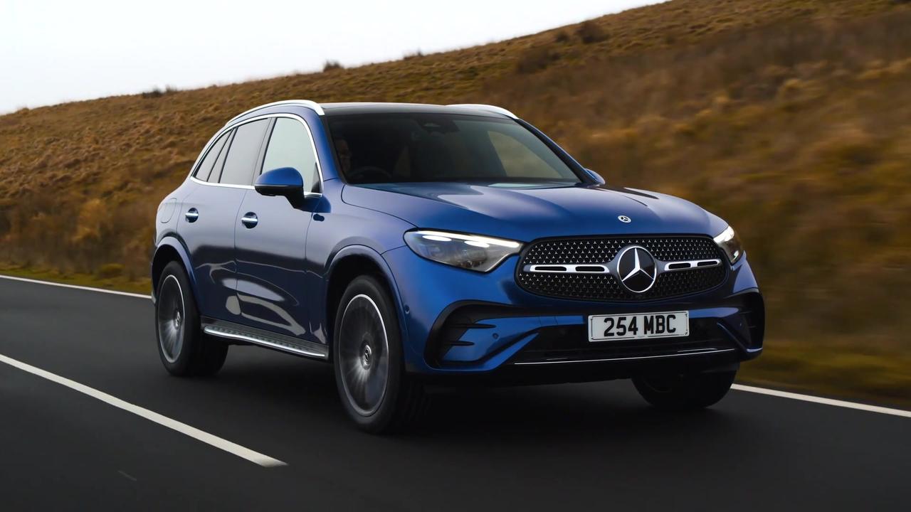 2023 Mercedes-Benz GLC 300 e in Blue Driving Video