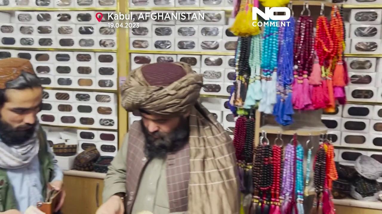 Taliban flock to buy perfume and headwear as they celebrate Eid al-Fitr