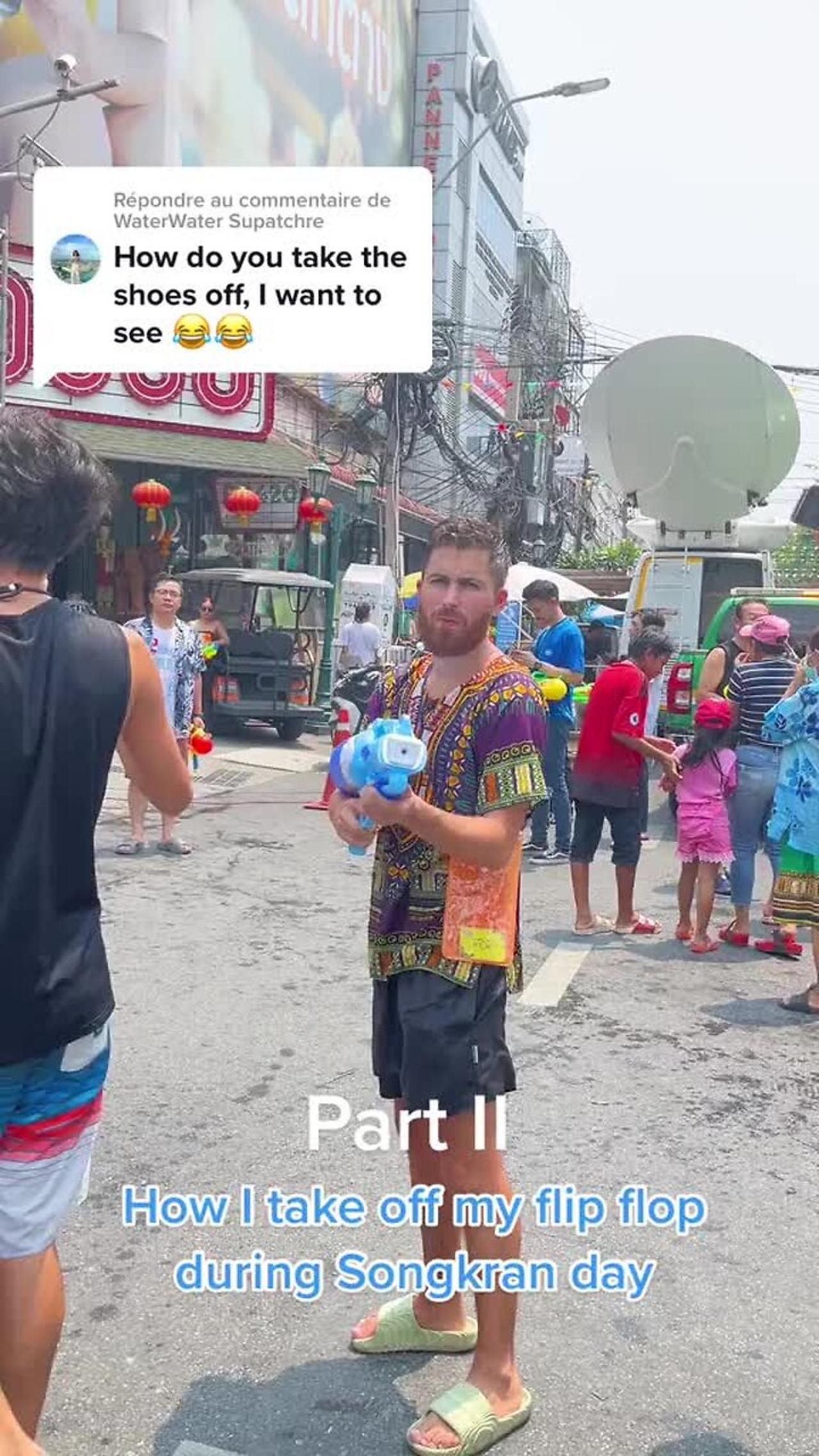 Guy gets his shoe stuck on his ankle during the Songkran Festival in Thailand!.mp4