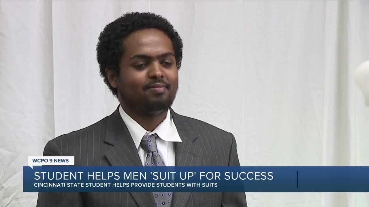 Student helps men 'suit up' for success