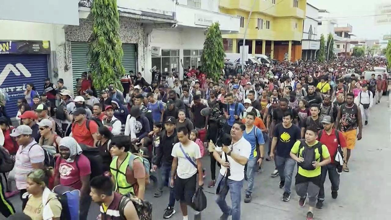 Thousands of migrants march through Mexico to demand justice