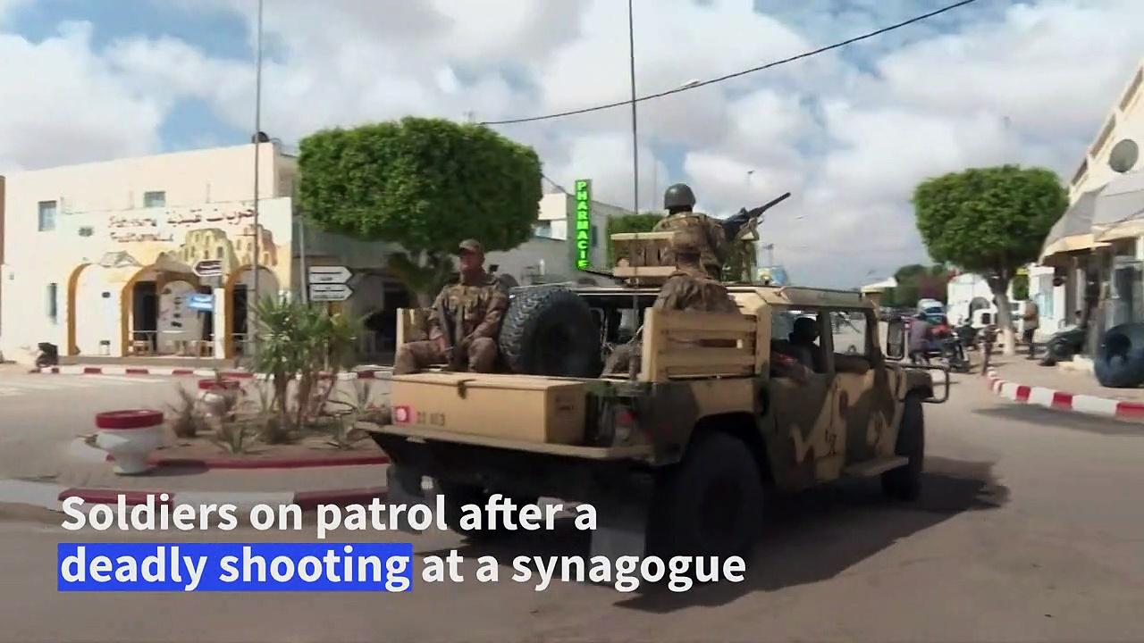 Tunisian soldiers patrol Djerba the morning after synagogue gun attack