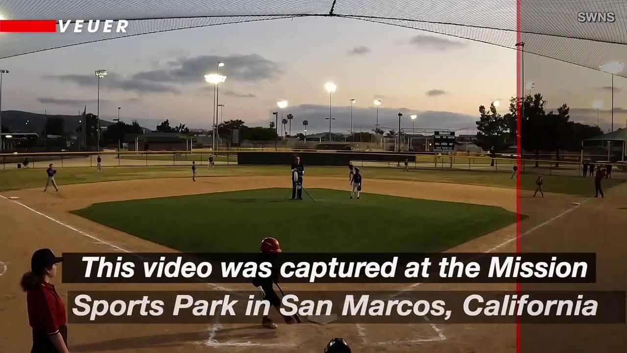 Security Camera Captures the Moment a Stray Bullet Nearly Strikes Little League Baseball Players