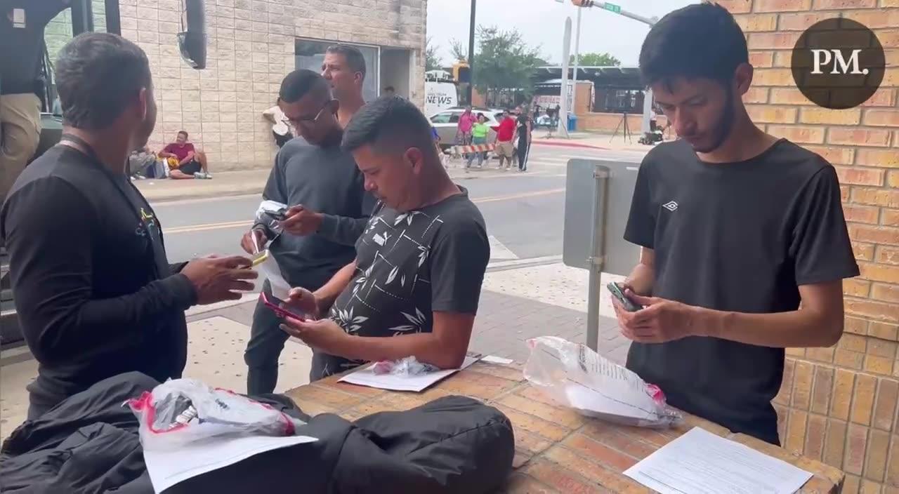 This is a great Redpill - Brownsville, TX: Migrants open their DHS packets and use their government issued taxpayer funded cell 