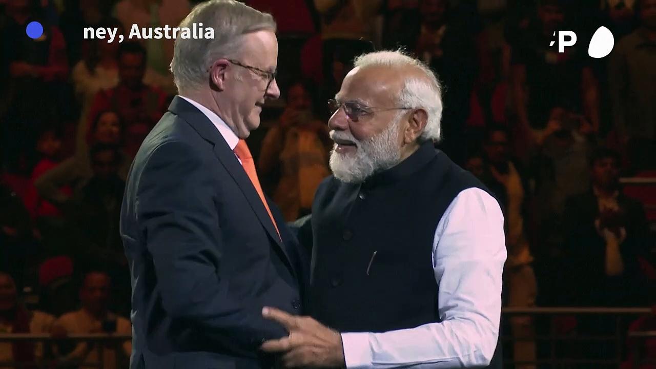 India's Modi embraced as 'the boss' by Australian PM during Indian leader's visit