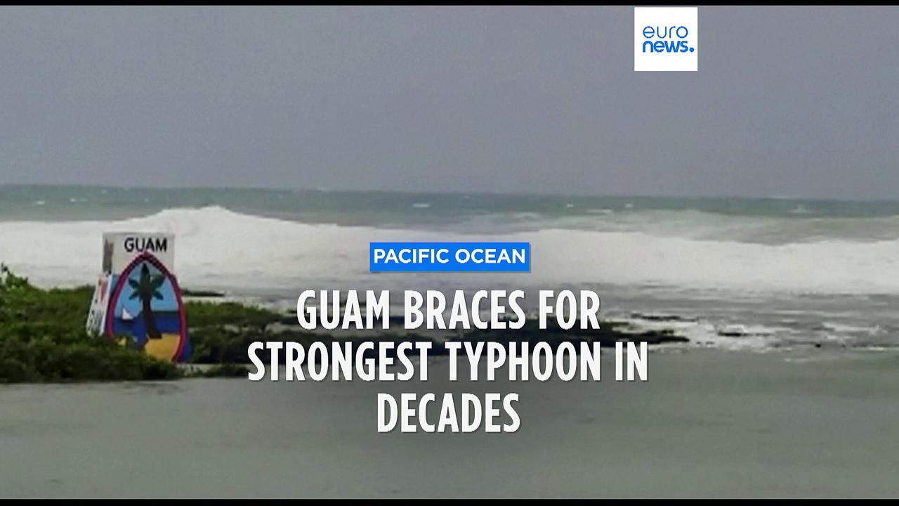 Rain and winds lash Guam as Typhoon Mawar closes in and residents shelter