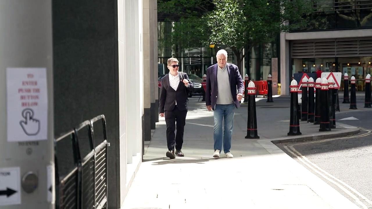 John Cleese arrives at court for phone hacking trial