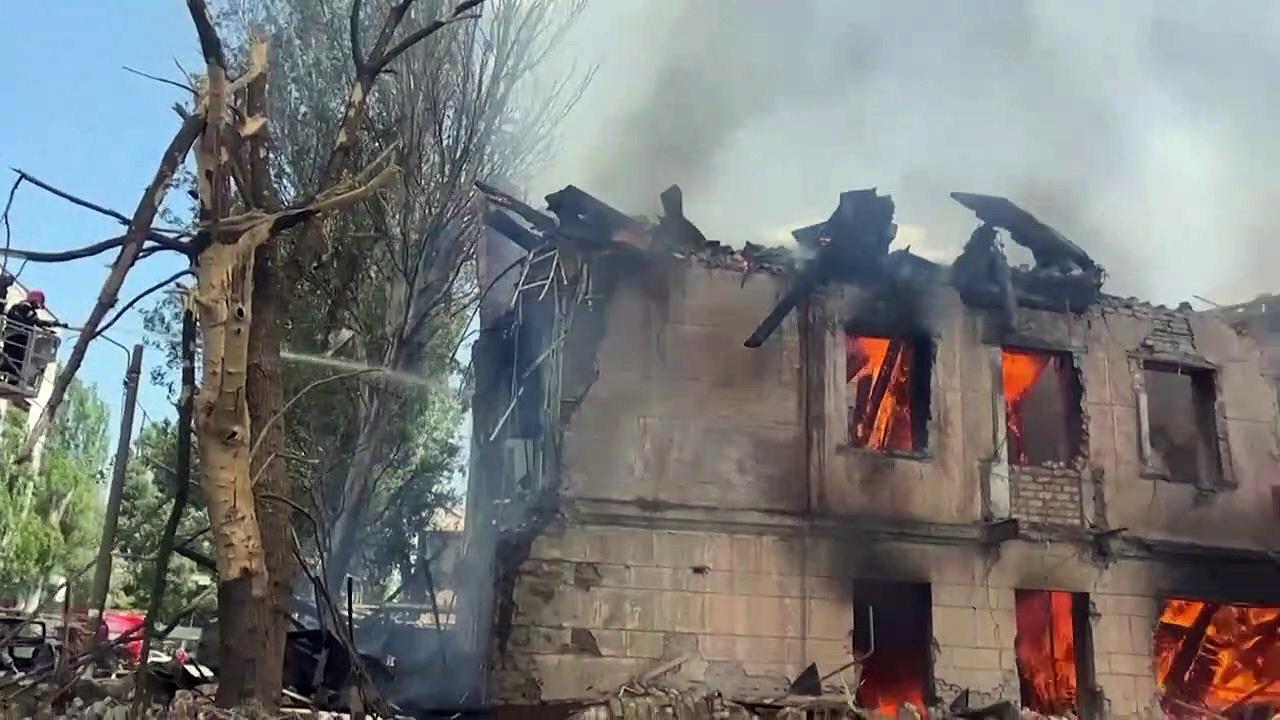 Firefighters in Dnipro tackle blaze after deadly Russian strike
