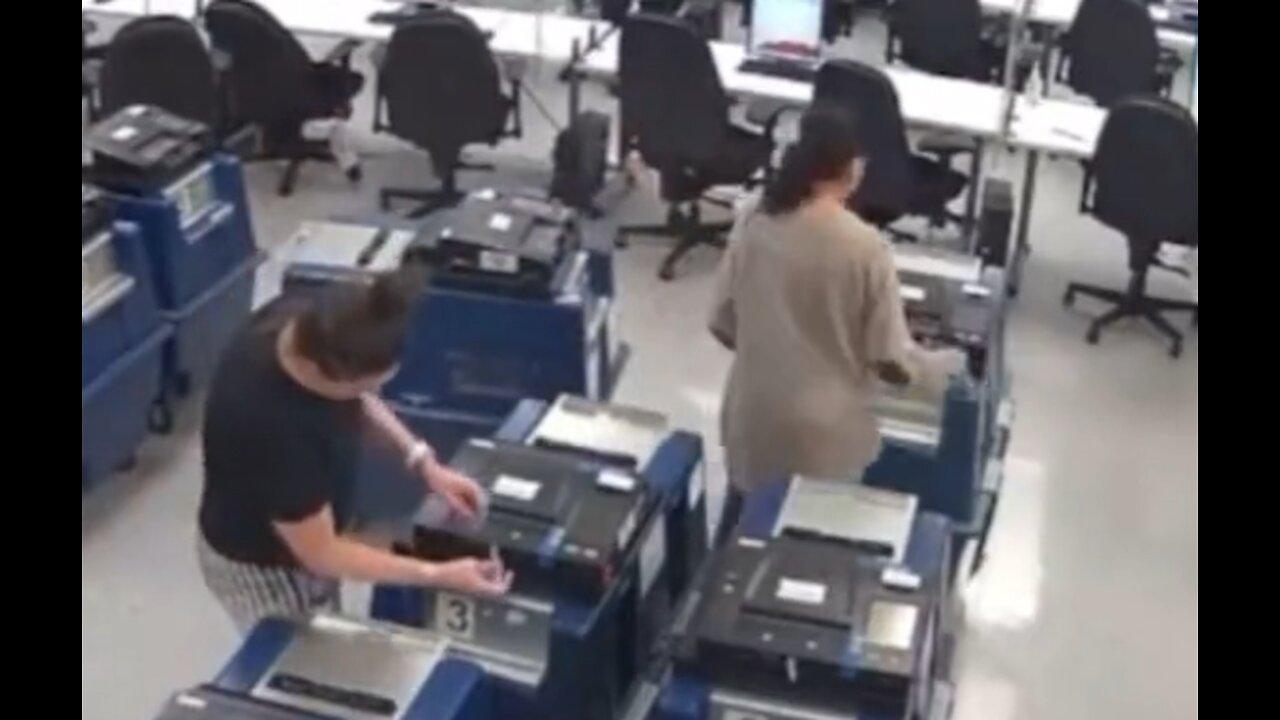 New video: Gloved Maricopa election official removing security seals & reprogramming memory cards