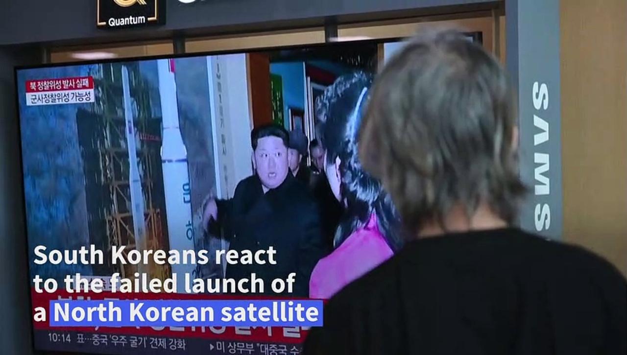 South Koreans react to North Korea's spy satellite launch