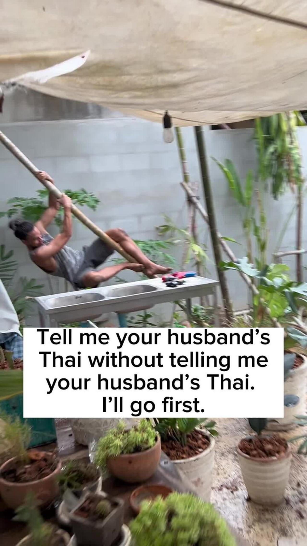 Woman is watching her husband remove a palm tree One News Page VIDEO