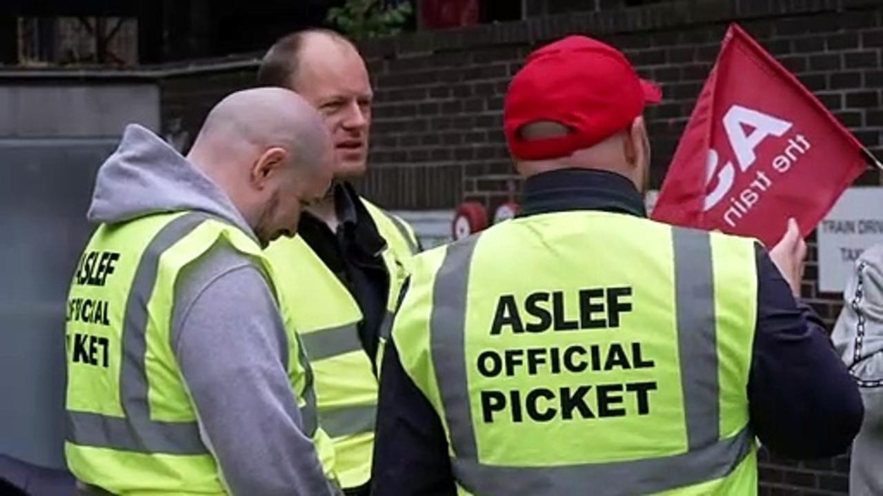 Rail strikes: ASLEF members gather at Euston Station