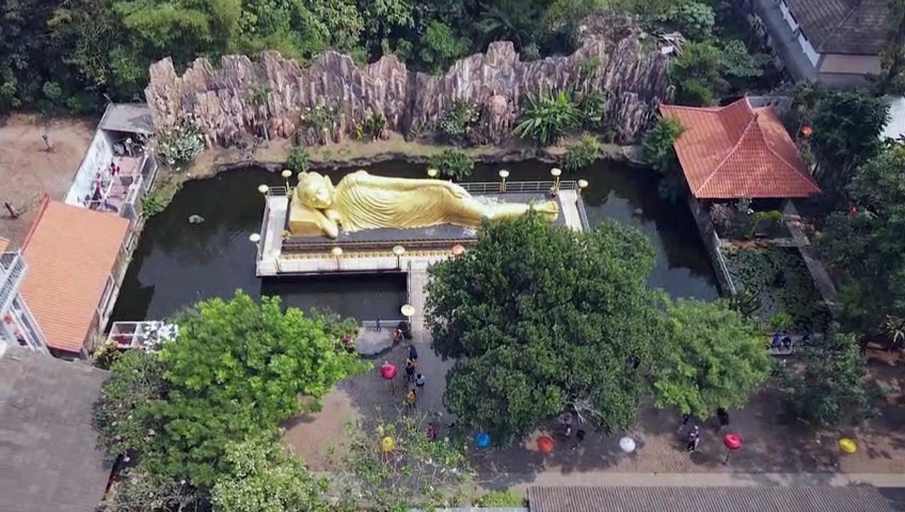 Visitors flock to Indonesia giant Buddha statue for Vesak Day