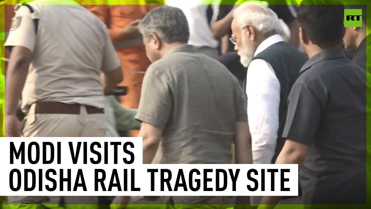India’s PM Modi visits scene of train crash that killed over 280 people