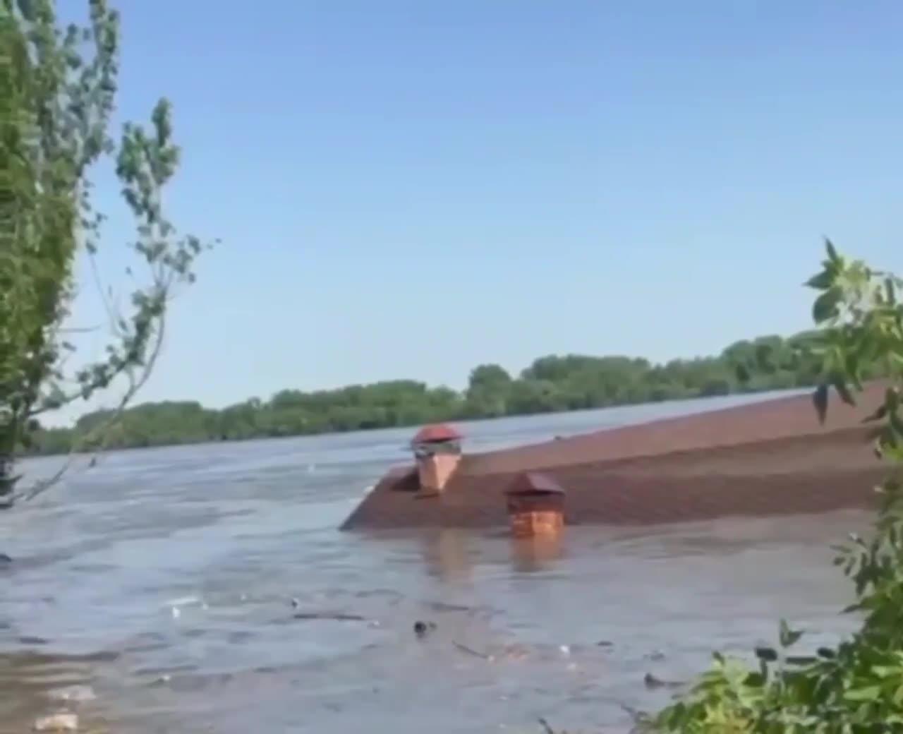 UKRAINE, FLOATING HOUSES AFTER FLOODING WERE NOTICED IN THE DNIEPER RIVER