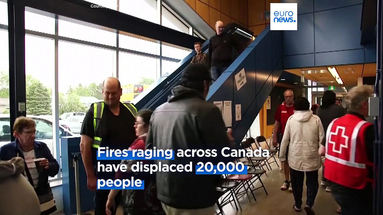 Canadian PM blames climate crisis as fires displace over 20,000 people