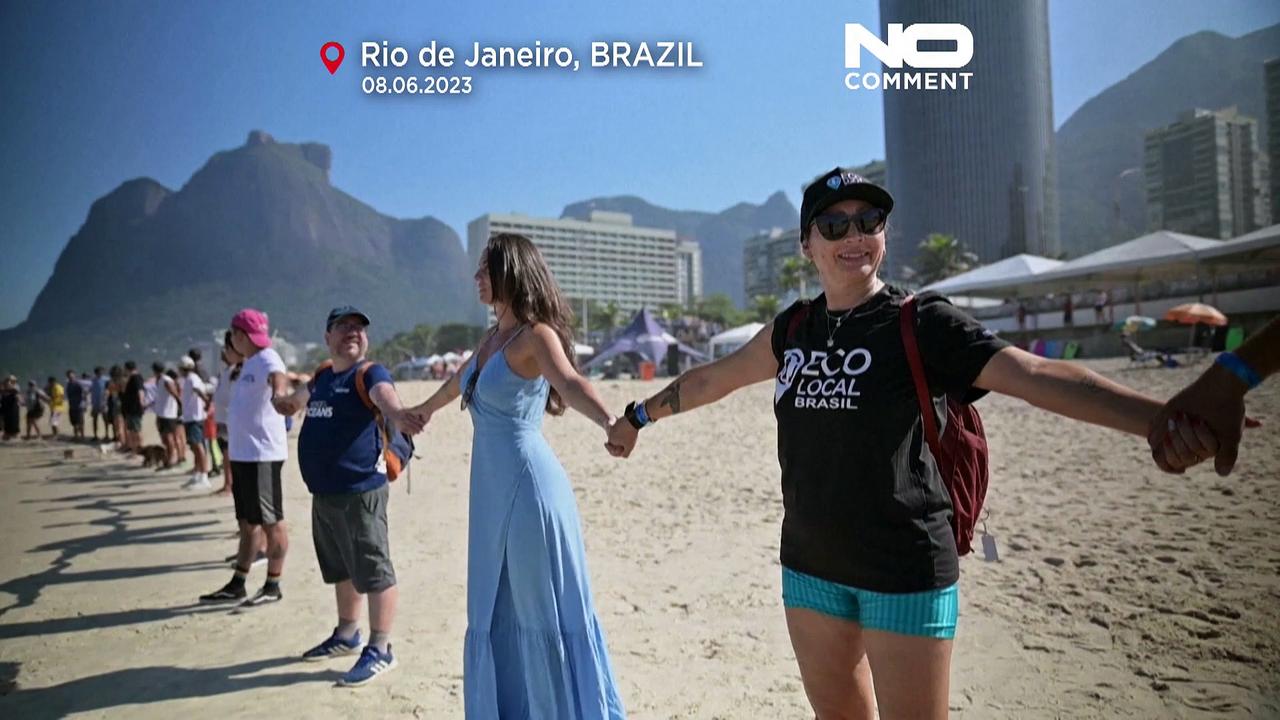 Watch: Thousands 'hug' the ocean on Brazil beach for World Ocean Day