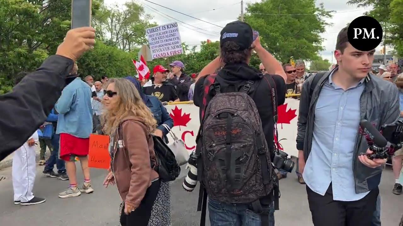 Concerned citizens chant "Leave our kids alone" at Education over Indoctrination protest in Ottawa.
