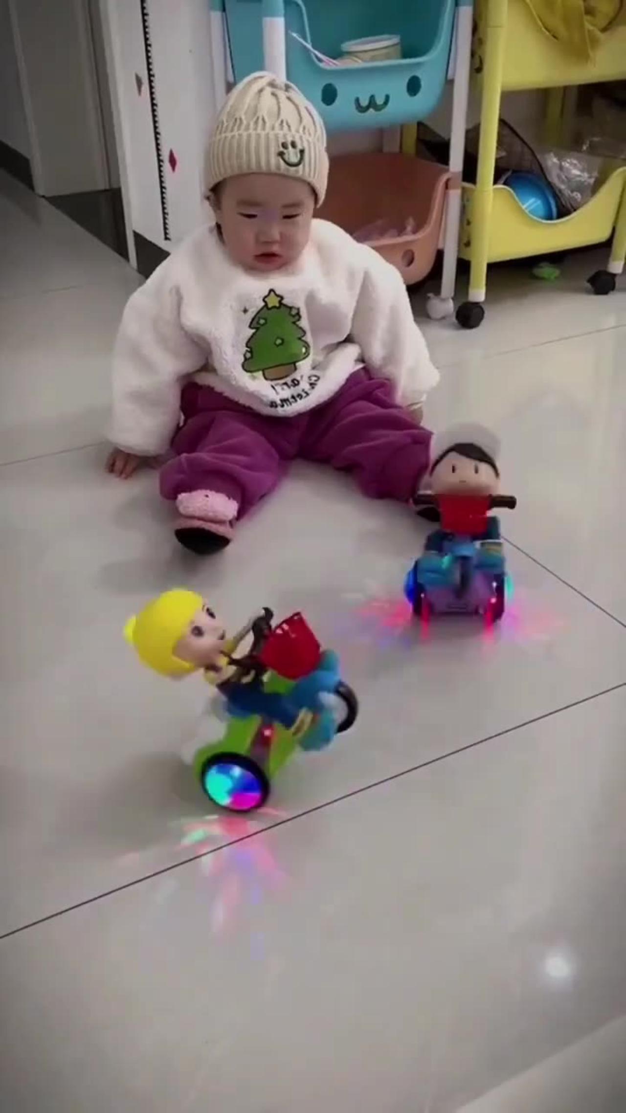 Cute baby playing with toys One News Page VIDEO