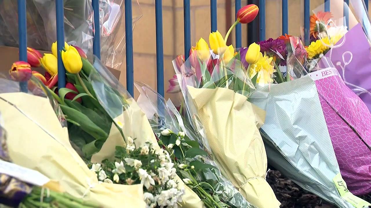 Flowers laid as police continue investigations in Nottingham