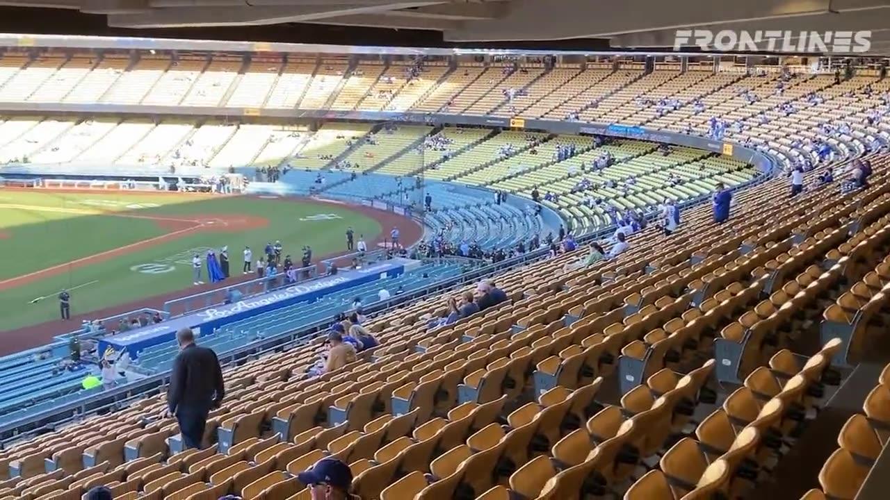 Dodger Stadium is empty >>> KEEP SHOVING IT DOWN OUR THROATS