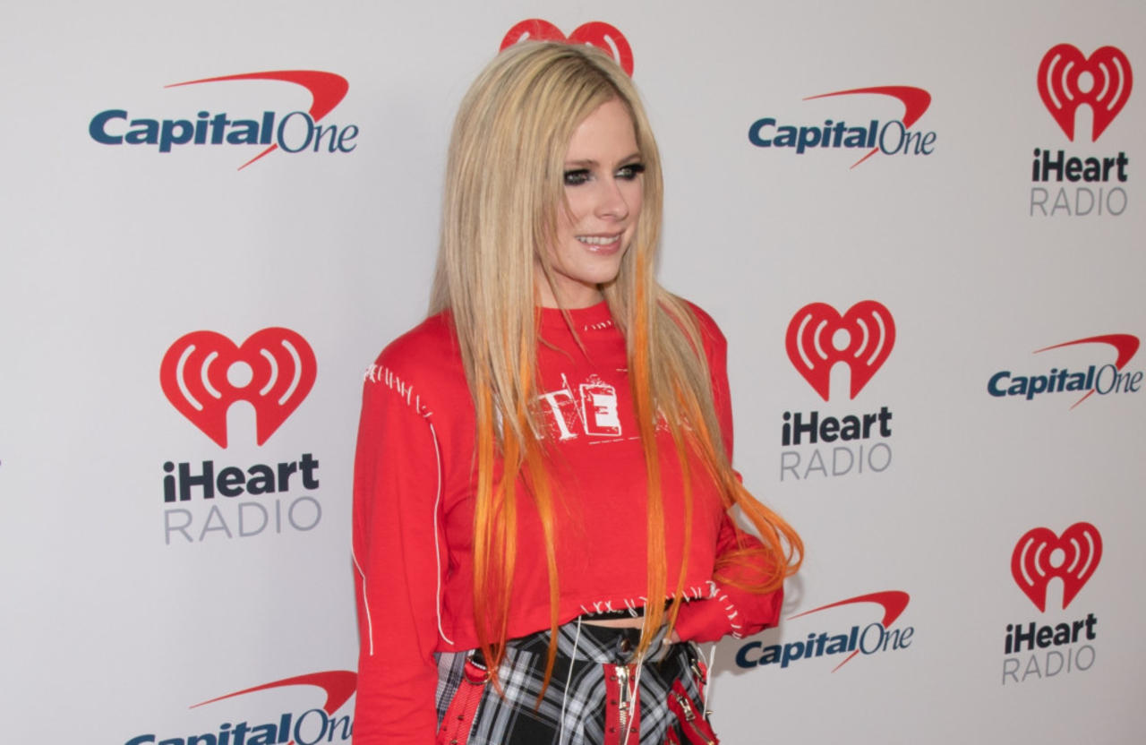 Why did Avril Lavigne end her relationship with Tyga?