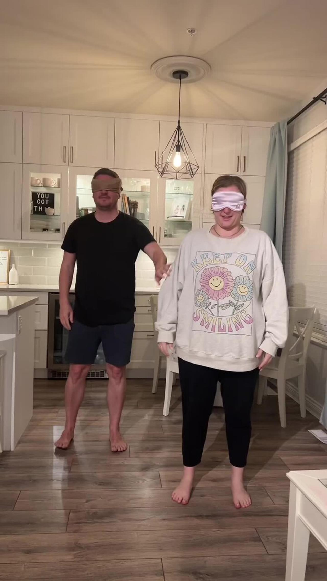 Couple is dancing blindfolded to see if they have similar dance styles!.MOV