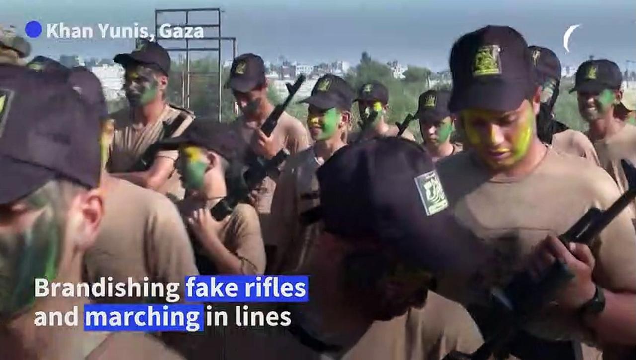 Palestinian youths take part in Islamic Jihad summer camp