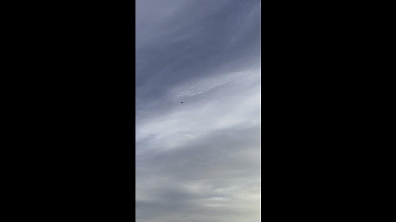 I CAUGHT WHAT LOOKS TO BE A MILITARY PLANE FLYING ABOVE HUNTINGTON BEACH PIER A LITTLE WHILE AGO!!