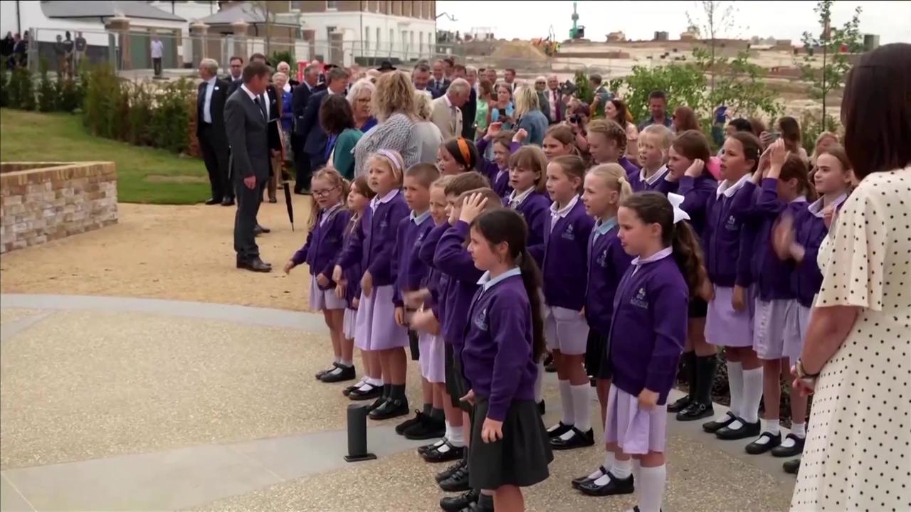 Britain's King and Queen visit suburb project