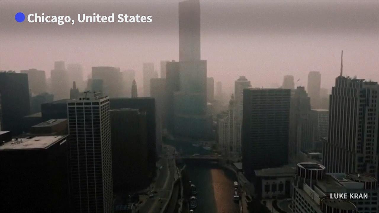 Smoke from Canadian wildfires cloaks Chicago with haze