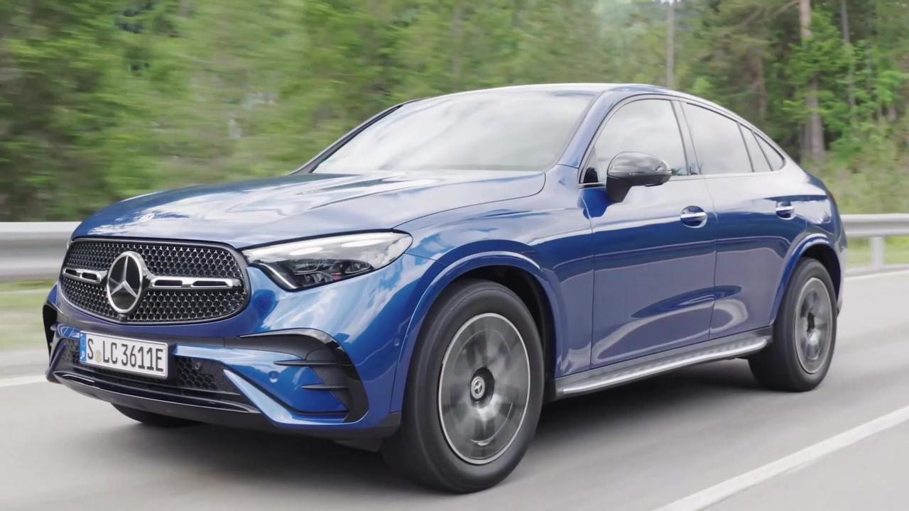 The new Mercedes-Benz GLC 400 e 4MATIC Coupe in Spectral blue Driving Video