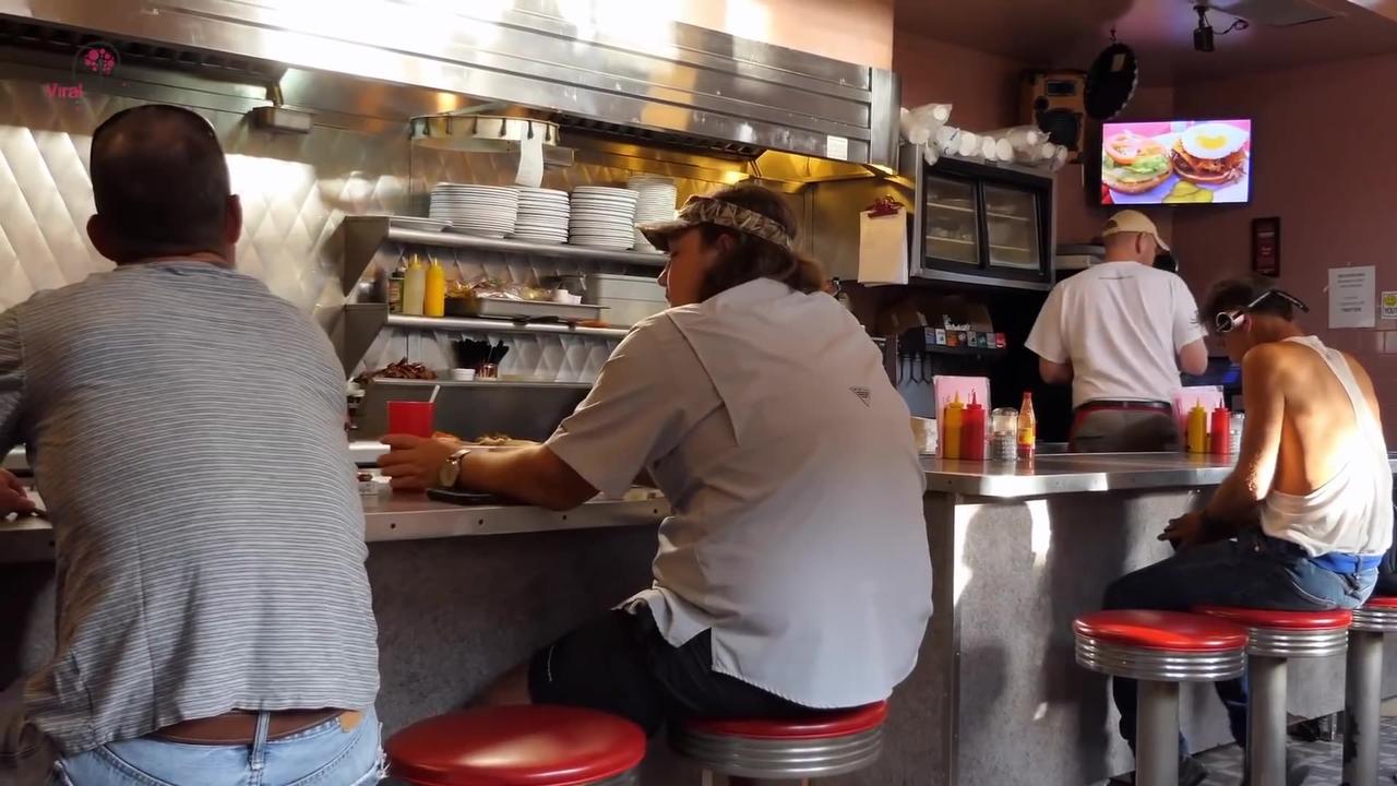 Invisible Compassion: Teens Mock Boy at Burger King, Unaware of Man on BenchTeens mock boy at burger