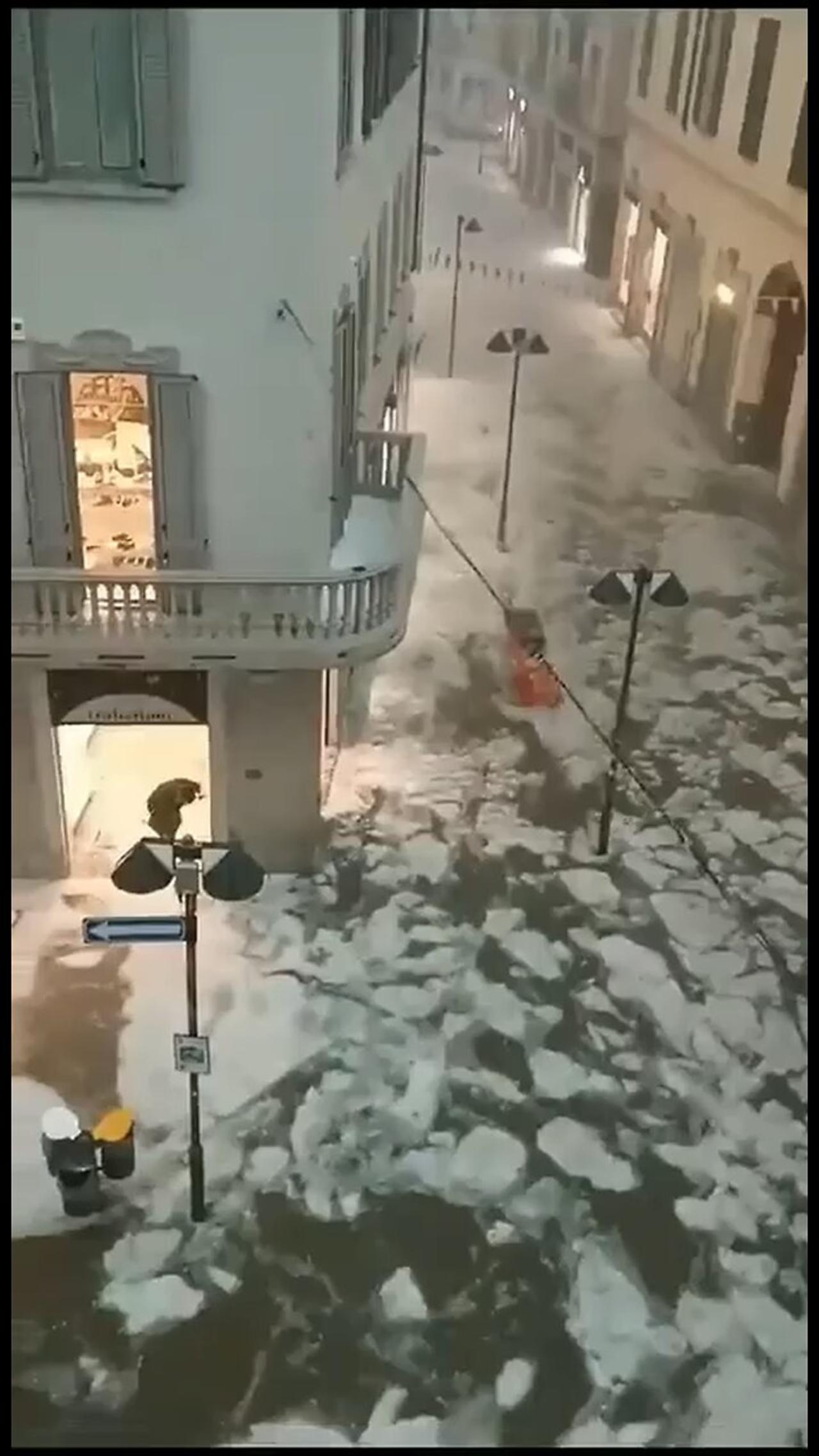"Frozen River Flows Through Streets of Seregno Italy! Surreal Scenes After Heavy Hailstorms 🌧️🧊"