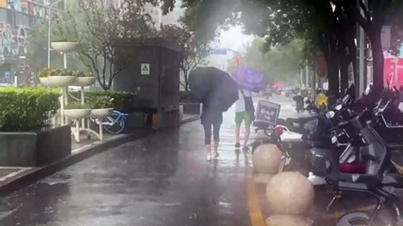 Beijing hit by torrential rain