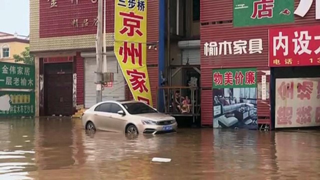 Floods for miles: swathes of China underwater after historic rain