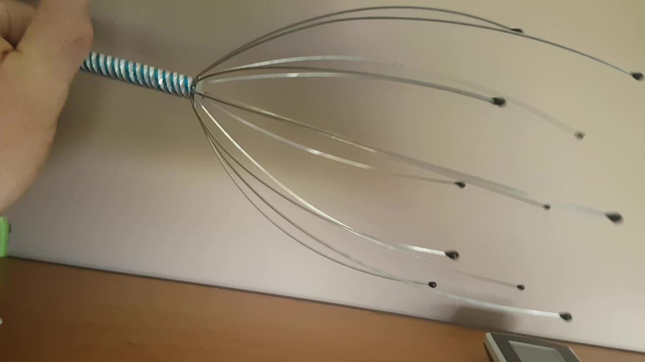 head massage tool One News Page VIDEO