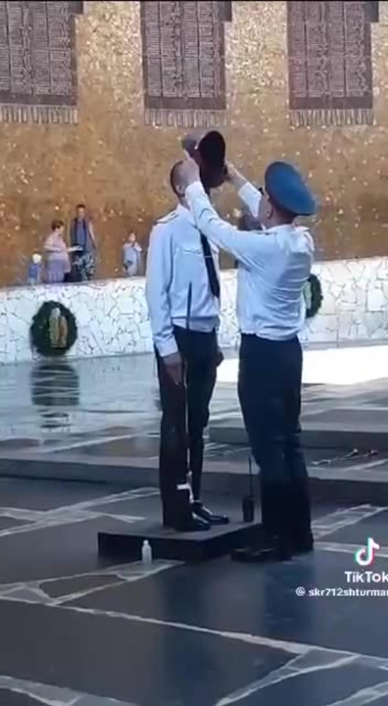 Commander shows a paternal kind of care for his subordinates serving in the Guard of Honor