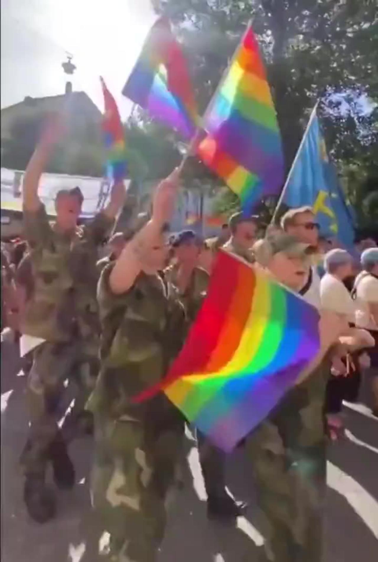 Swedish military personnel hold pride parade, sing ‘Highway to Hell’