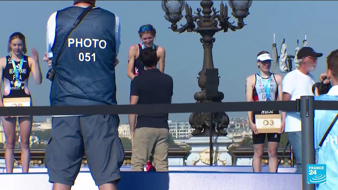 'What a special place to be in': Triathletes swim in the Seine ahead of Paris Olympics