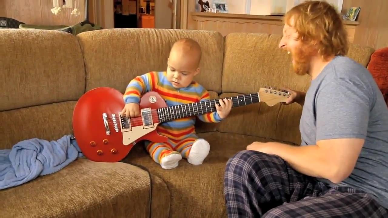 Guitar baby video viral Rocksmith baby paying in the  room