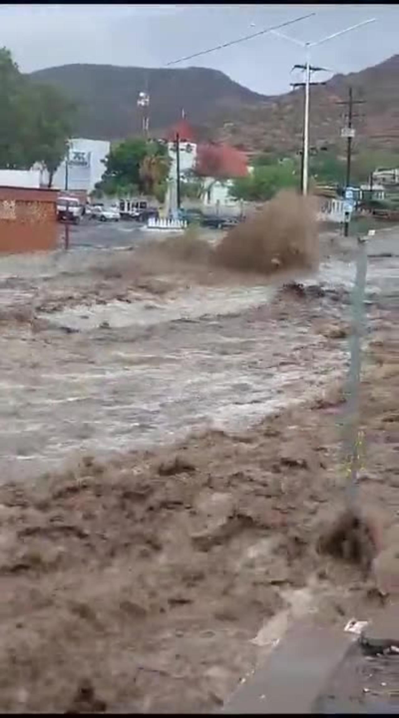Hurricane Hilary brings major flooding around Santa Rosalía, Baja California Sur, Mexico. 👀
