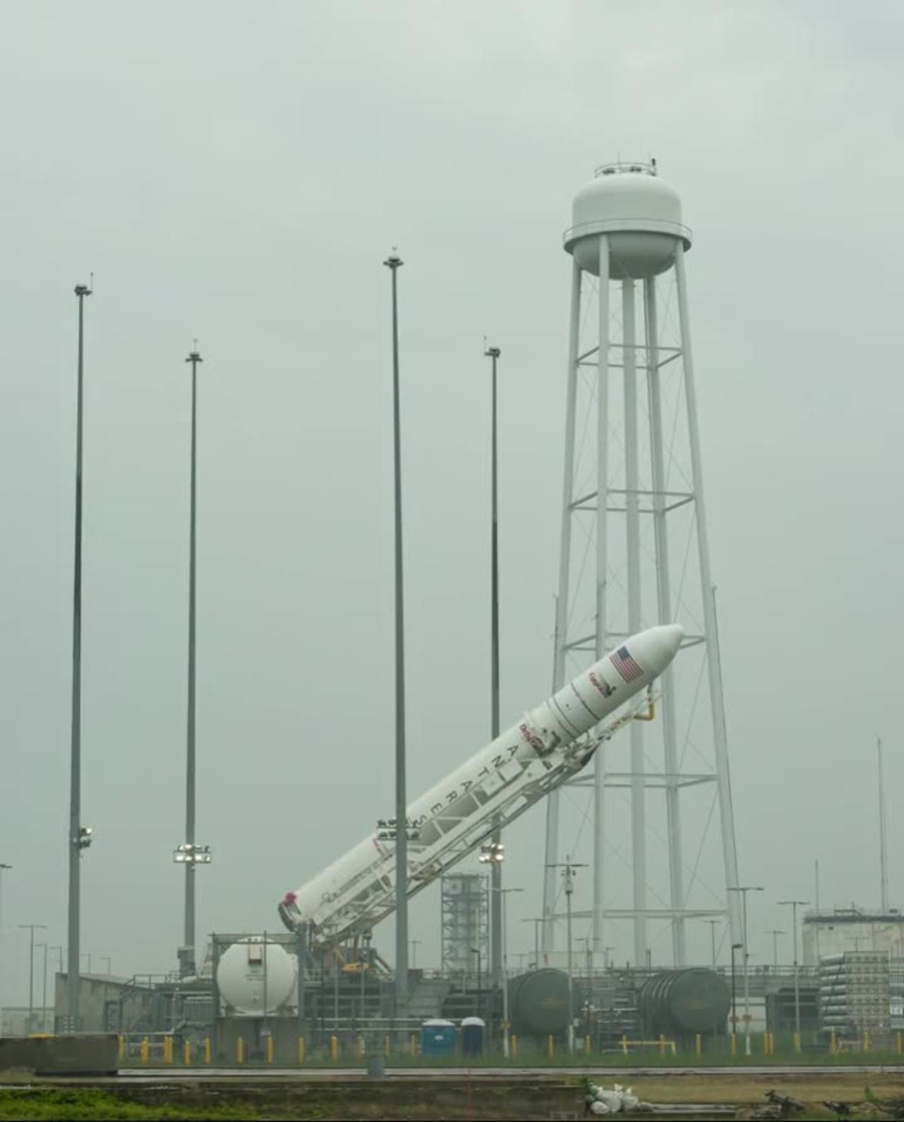 Antares rocket raised on launch pad