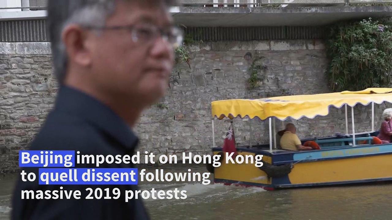 Wanted Hong Kong activists in Britain decry 'harassment'