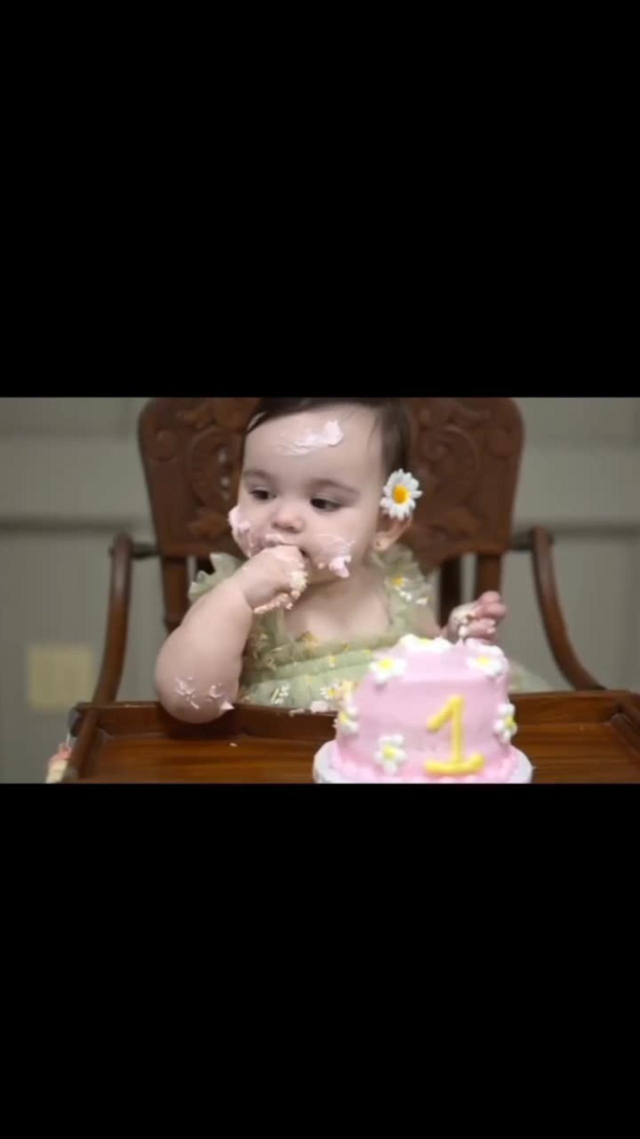 Cute Baby eating cake