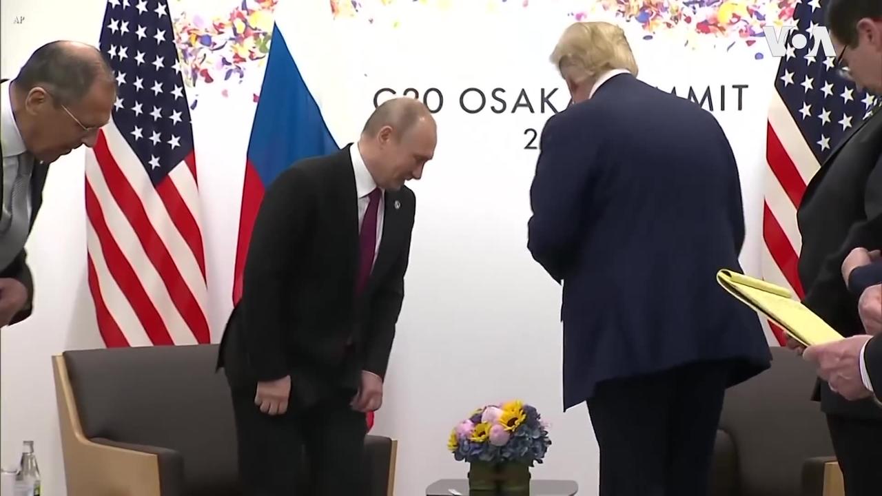 Trump and Putin meet at the G- 20 summit