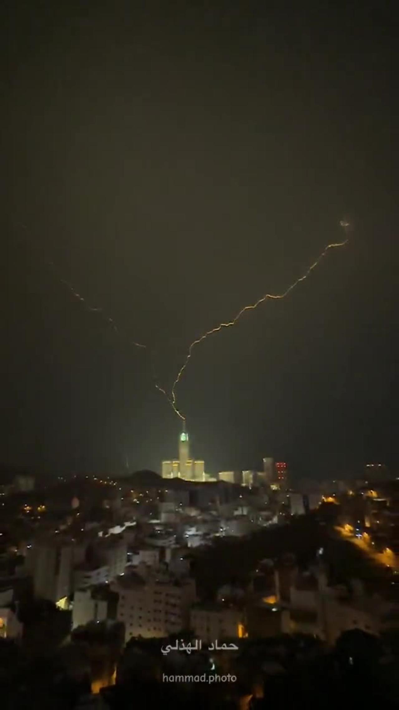 Saudia arabia MACCA , lightning strikes "CLOCK TOWER".