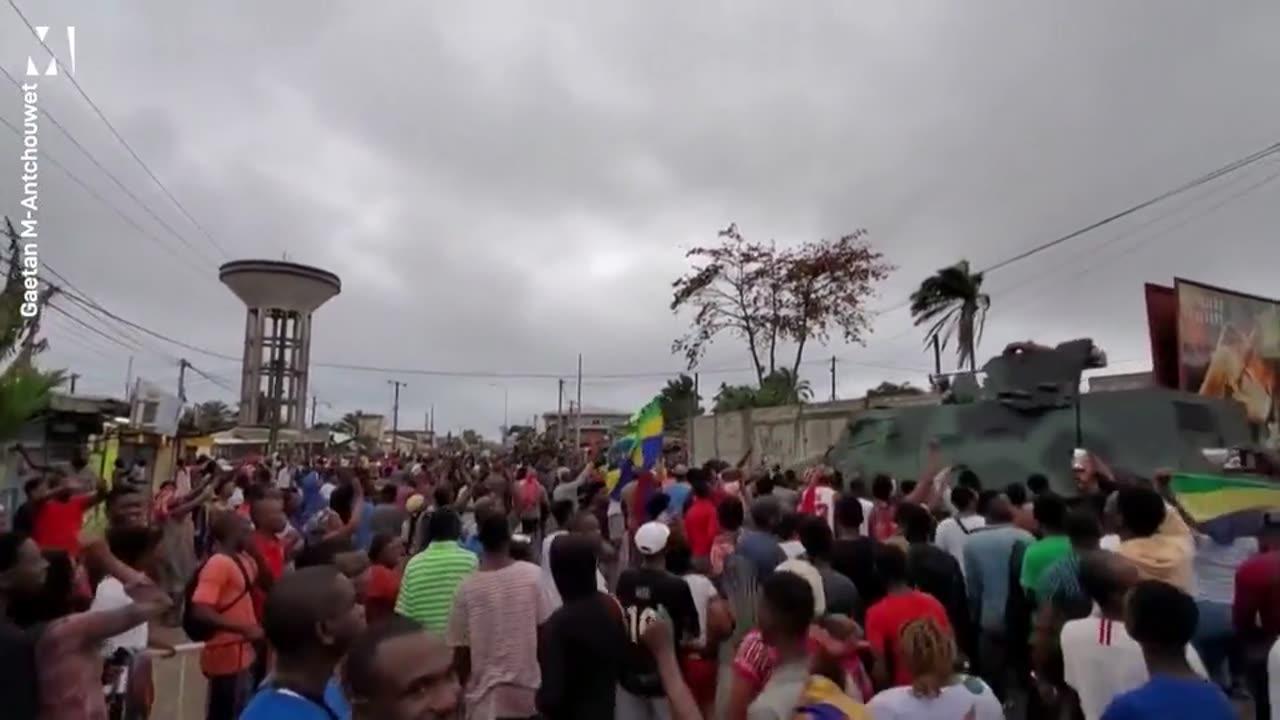 Crowds cheer on the military after a coup in Gabon
