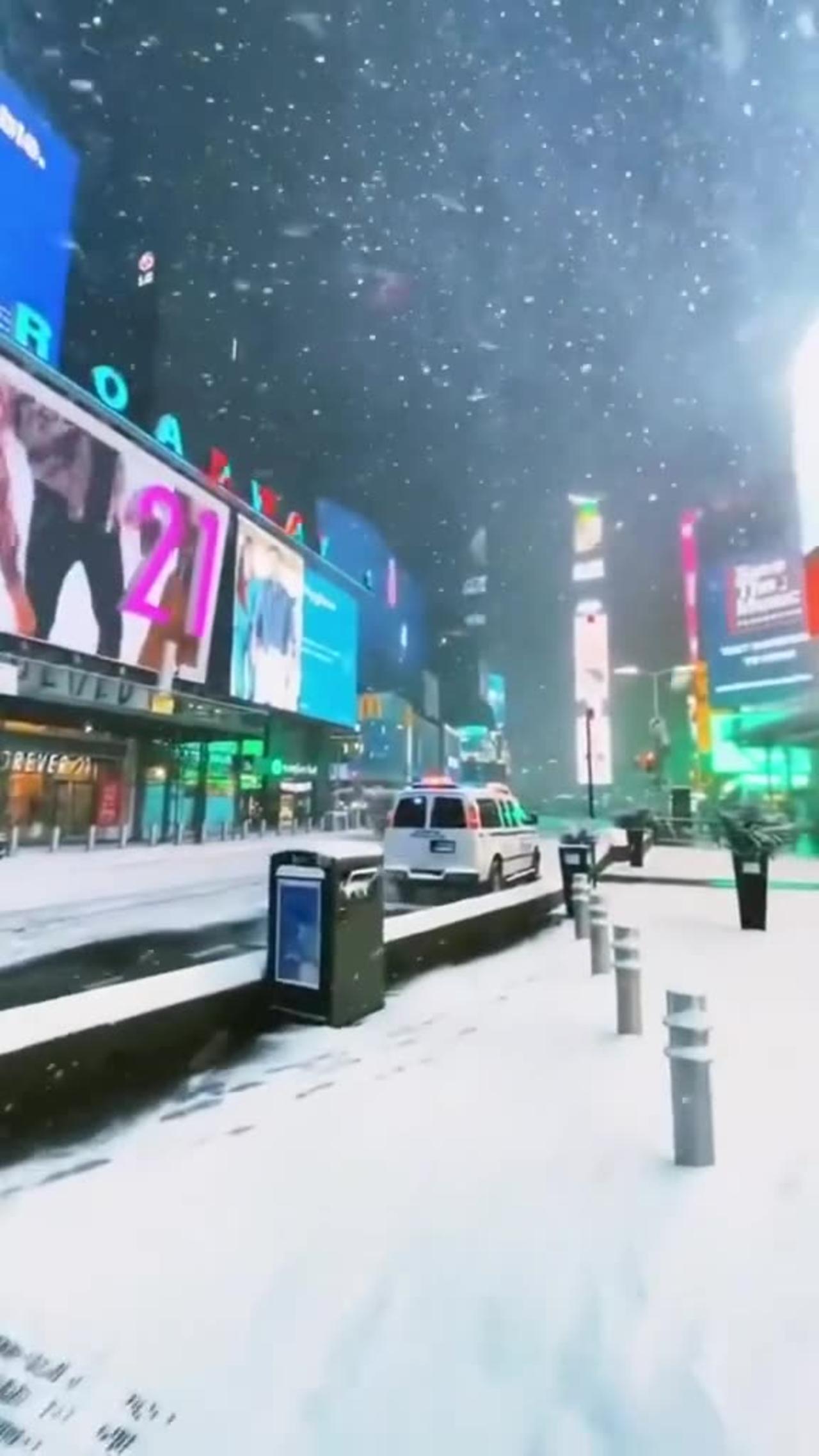 Snowfall in Times Square New York.